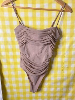 Aritzia’s Babaton Mesh Bodysuit Top